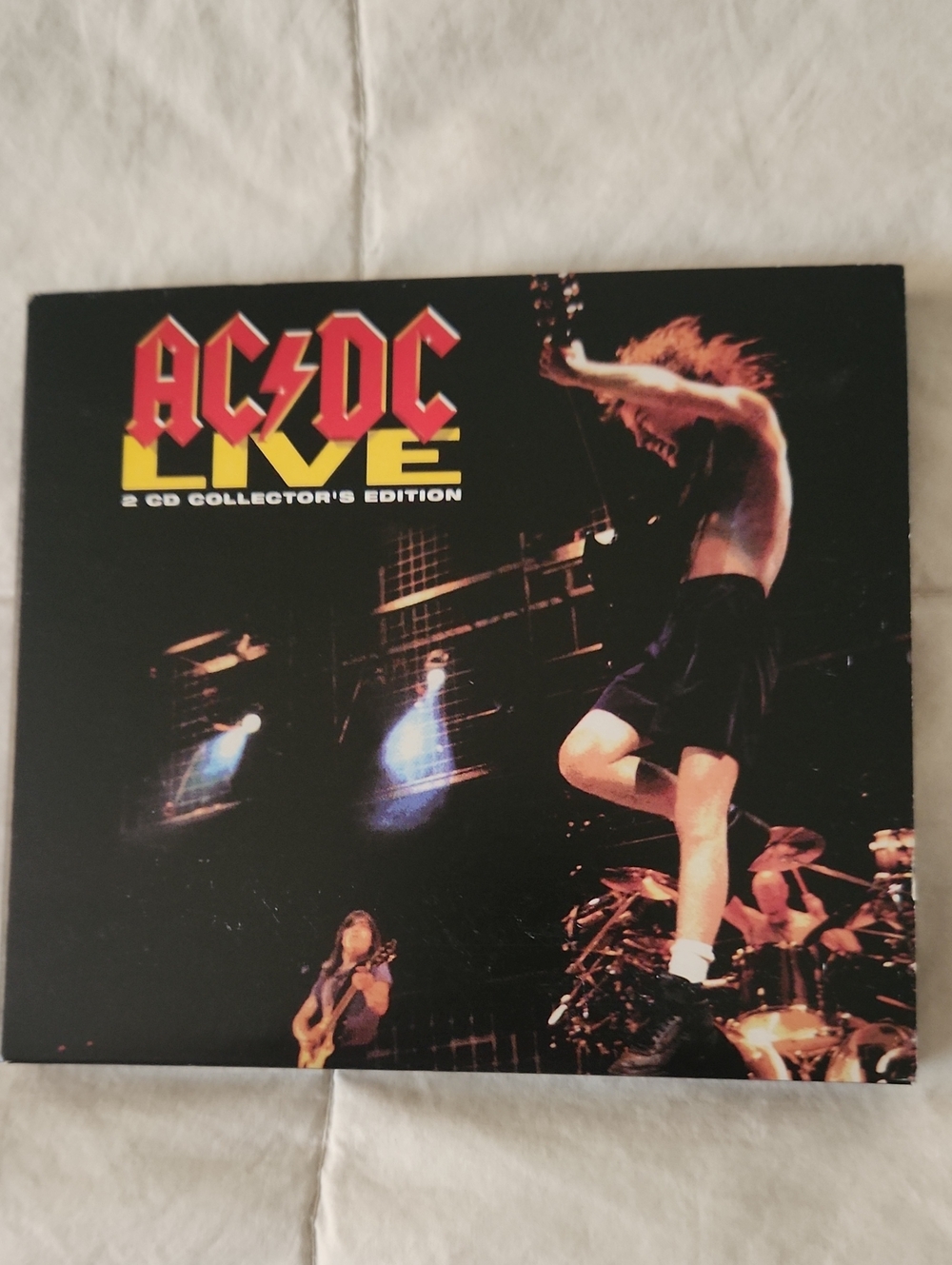 AC/DC Live Album Cover — Black, Yellow, Red Concert Art